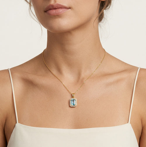 Zlatý přívěsek s topazem