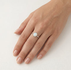 Sterling silver ring with white opal