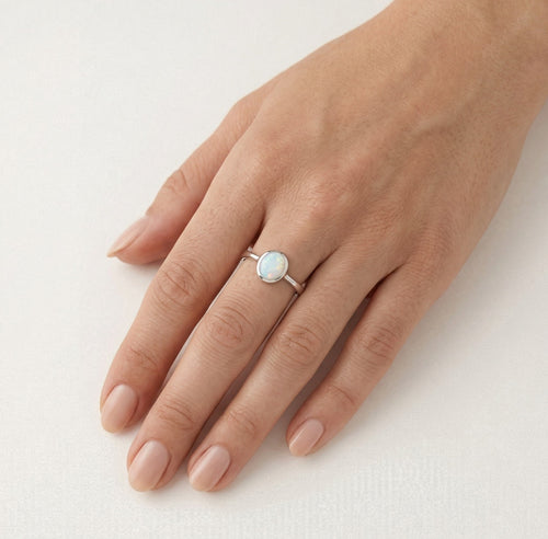 Sterling silver ring with white opal