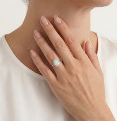 Royal birnenförmiger weißer Opal Ring