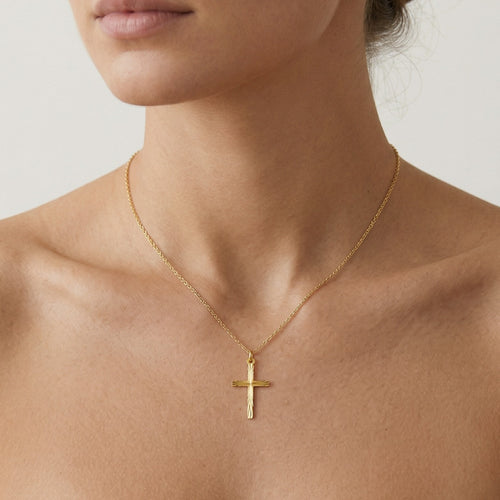 Croix en or avec motif