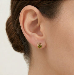 Boucles d'oreilles élégantes en forme d'éclipse avec des moldavites rondes.