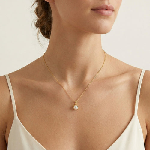 **Pendentif unique en perle blanche**