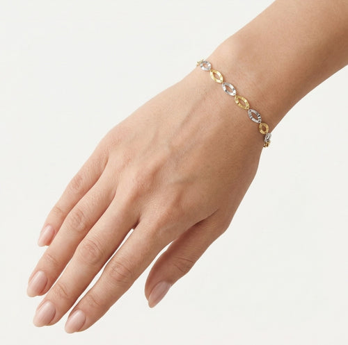 Bracelet en or bicolore avec article rond