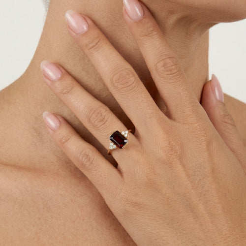 Stylish emerald cut garnet ring with cubic zirconia