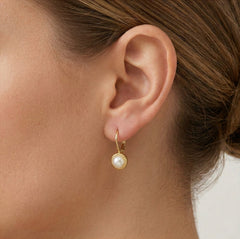 Boucles d’oreilles simples en or avec perle