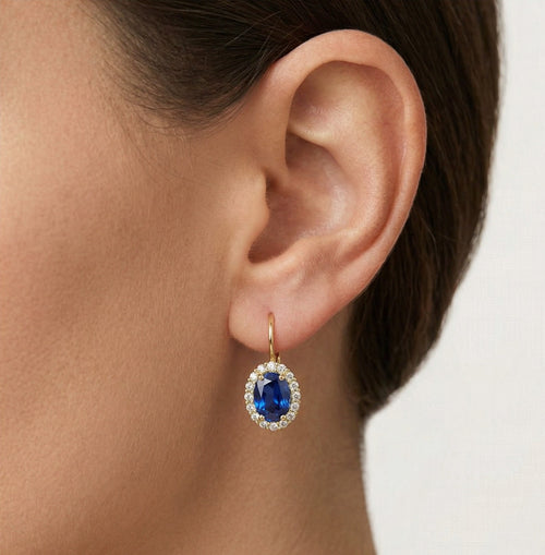 Zlaté náušnice s oválným syntetickým safírem