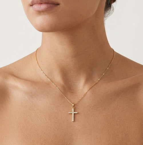 Cruz reversible con circonitas y ónix.