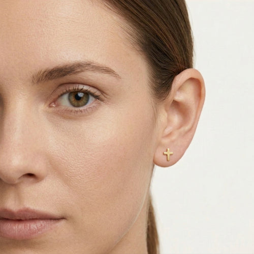 Cross stud yellow gold earrings