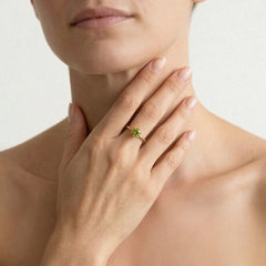 Round moldavite gold elegance