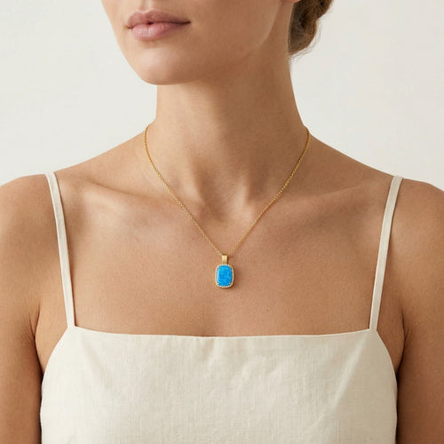 pendientes-masivos-de-oro-con-opalo-azul-cabujón