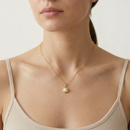 Pendentif simple en or avec perle