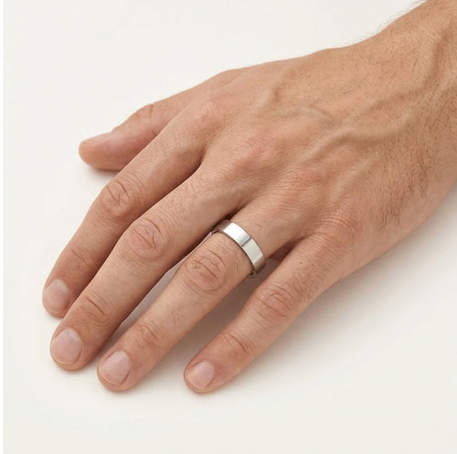 Anillo de boda de oro blanco con engaste a presión