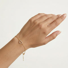 Gold bracelet with one heart
