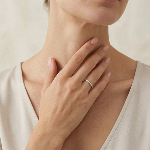 Minimalistic white gold ring with diamonds