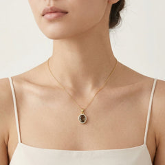 Oval smoky topaz gold pendant