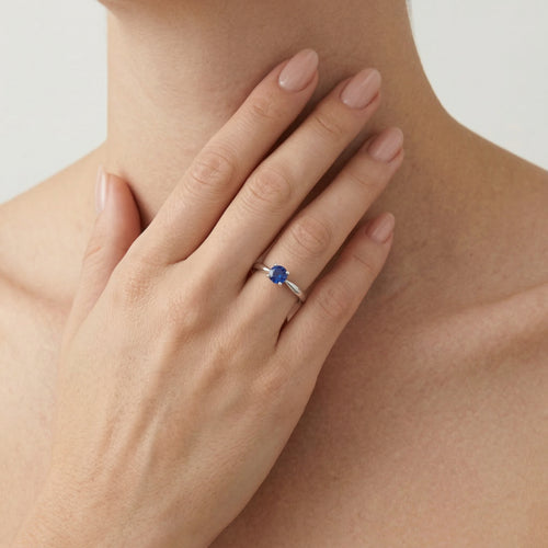 Simple white gold ring with sapphire