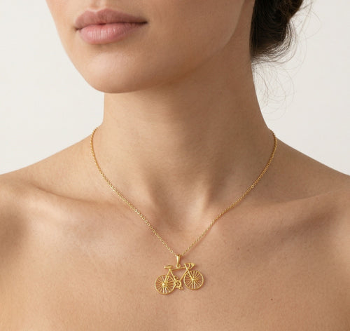 Pendentif vélo en or jaune