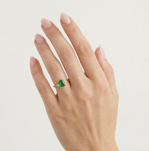 Yellow gold diamond and emerald ring