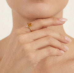 Zlatý prsten s oranžovým citrínem a kubickými zirkony