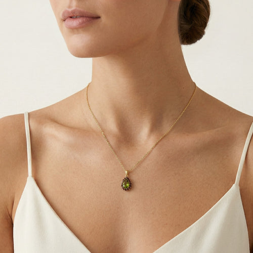 Golden Serenade Pendant In Yellow Gold With Pear Moldavite And Round Garnet