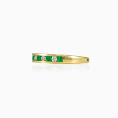 Ring with combination of emerald and diamond