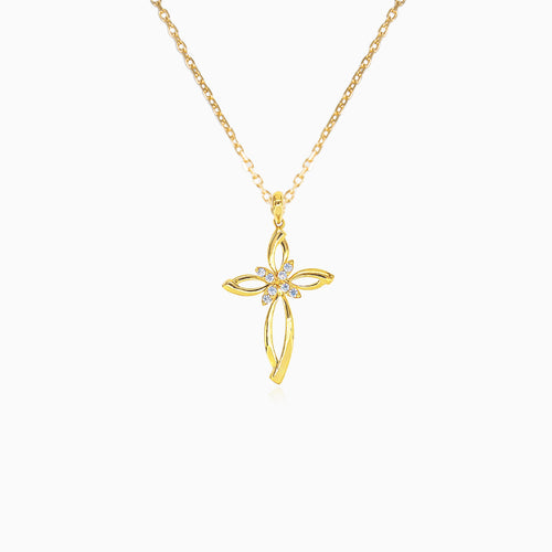 Small gold detailed cross with zircons