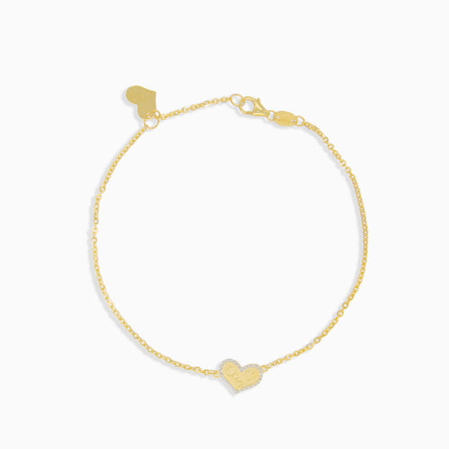 Gold bracelet with engraved hearts