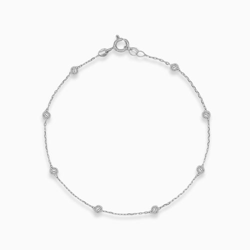 Náramek z bílého zlata s jednoduchými kuličkami
