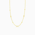 Zlatý náhrdelník s kuličkami a obdélníkovými zirkony