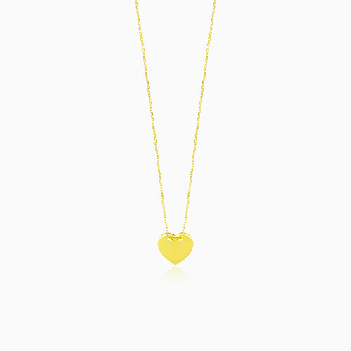 Gold necklace with a delicate heart