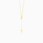 Gold necklace with infinity and cross