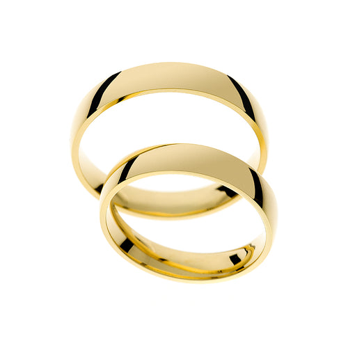 Anillo de boda clásico de oro amarillo con alto pulido.