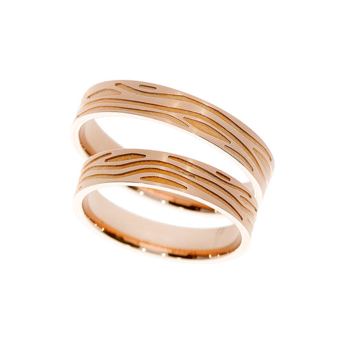 Bague de mariage classique en or rose avec lignes gravées