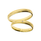Bague de mariage élégante en or jaune avec lignes croisées
