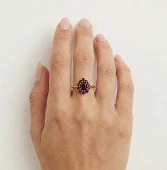 Radiant halo yellow gold garnet beauty ring