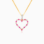 Heart pendant with diamonds and pink sapphire
