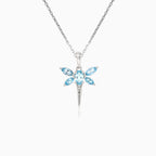 Pendentif libellule en or blanc avec diamant et topaze bleue