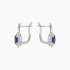 Elegantní náušnice z bílého zlata s diamanty a modrými safíry