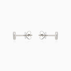 Dazzling round cut diamond earrings in lustrous white gold