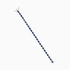 Gold tennis bracelet with sapphire and diamonds