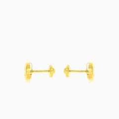 Boucles d'oreilles clous en or avec serti.