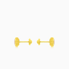 Boucles d’oreilles en or avec fleur et zirconium cubique étincelant