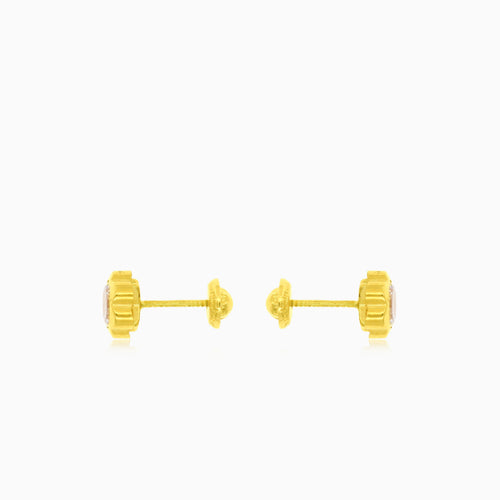 Boucles d’oreilles en or avec fleur et zirconium cubique étincelant