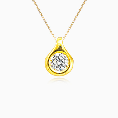 Zlatý přívěsek s kulatým zirkonem osazeným v lunetě