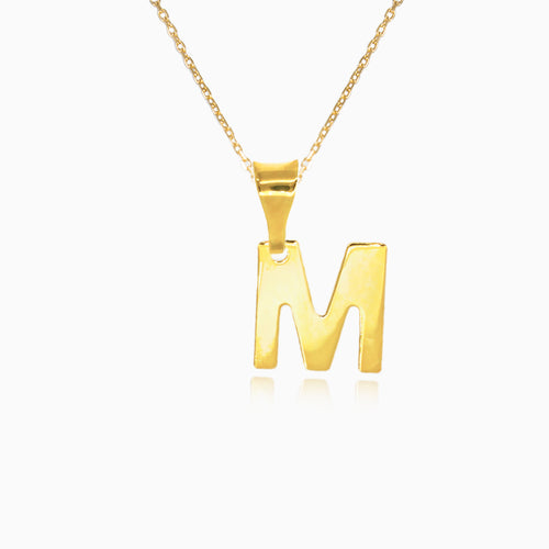 Zlatý přívěsek písmene "M"