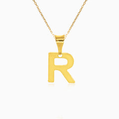 Gold pendant of letter R