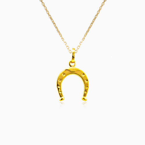 Colgante de herradura de oro amarillo