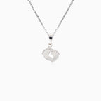 Delicate white gold baby feet pendant