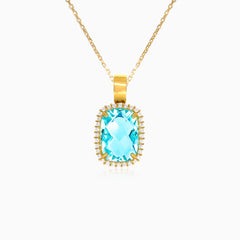 Yellow gold cushion cut blue topaz halo pendant
